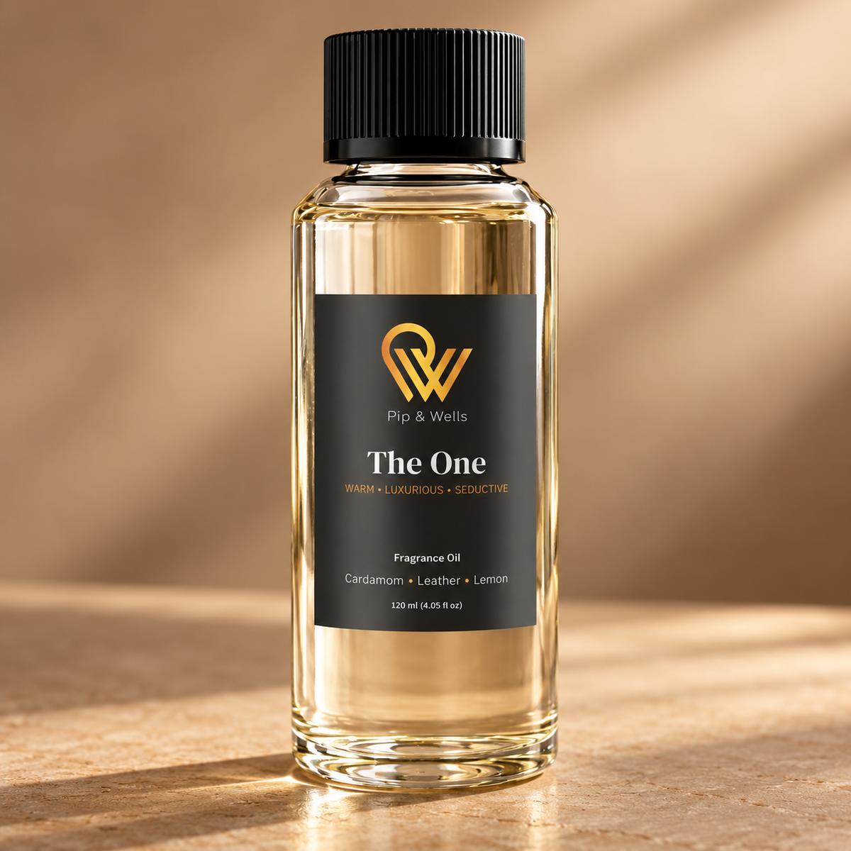 Close-up of the label on a 120 ml Pip & Wells The One fragrance oil bottle